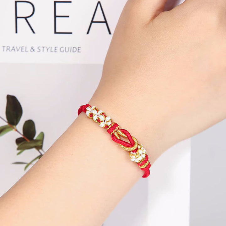 Bransoletka ochronna na szczęście z węzłami pokoju i ośmioma nitkami z Buddha Stones