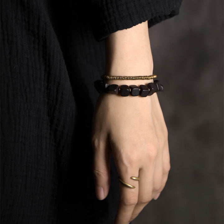 Bransoletka Buddha Stones z drewna hebanowego i miedzi z podwójnym owinięciem w stylu Tybetu