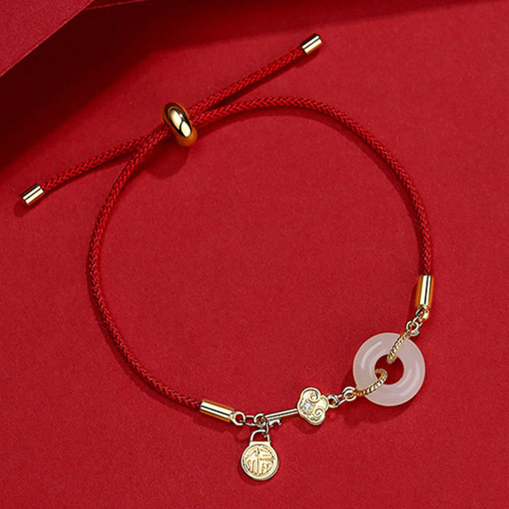 Buddha Stones 18K pozłacane Hetian Jade Peace Buckle Fu Character Luck Red Rope Bracelet
