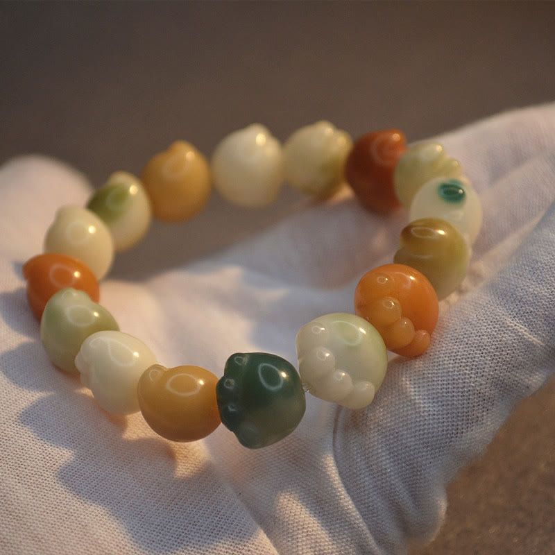 Wielowarstwowa bransoletka z Buddha Stones z nasionami Bodhi i słodkimi łapkami kota - image 4