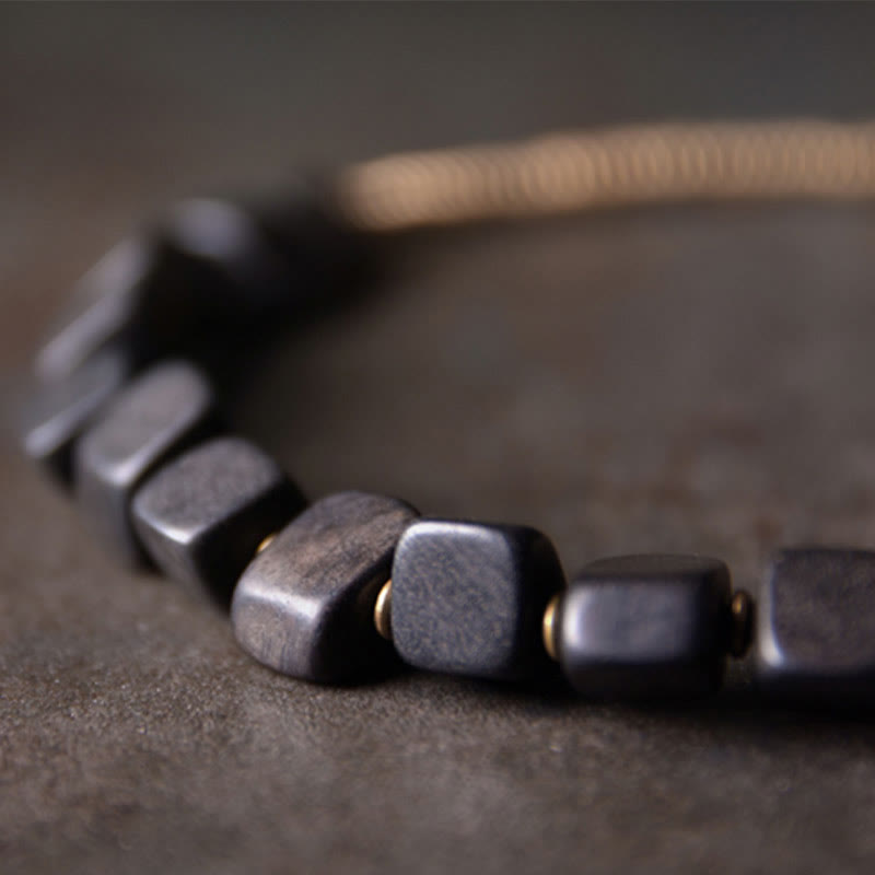 Bransoletka Buddha Stones z drewna hebanowego i miedzi z podwójnym owinięciem w stylu Tybetu