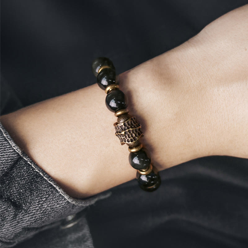 Bransoletka uzdrawiająca z tęczowego obsydianu i miedzi z Buddha Stones