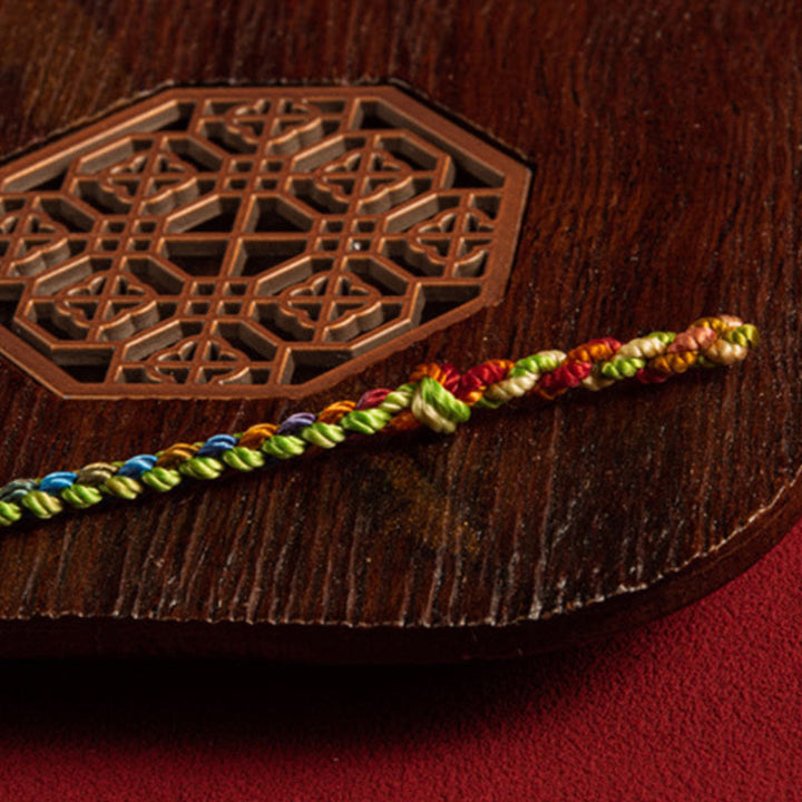 Buddha Stones „Niech będziesz błogosławiony pokojem i bezpieczeństwem przez wszystkie cztery pory roku” Bransoletka na szczęście wielokolorowa