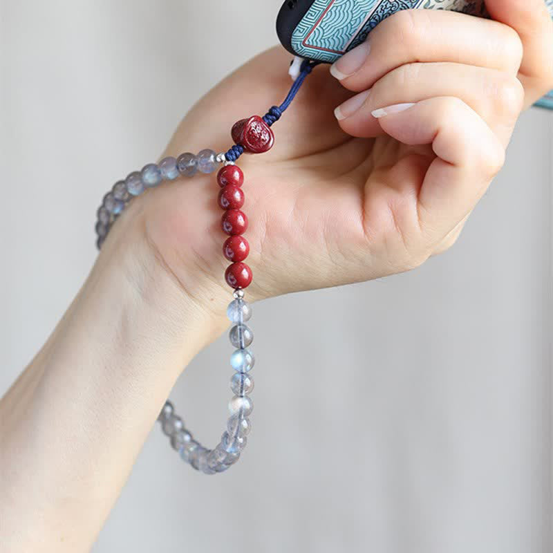 Naturalny kamień księżycowy cynober spokojna pozytywna dekoracja telefonu