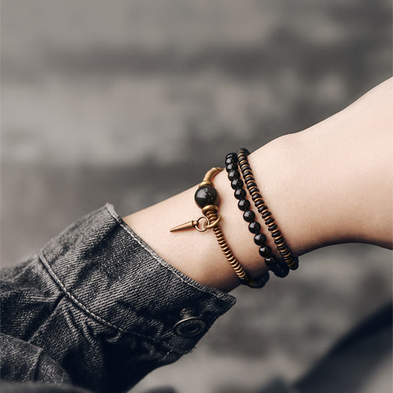 Bransoletka lecznicza z Buddha Stones, tęczowym obsydianem, drewnem hebanowym i miedzią, potrójnie owinięta