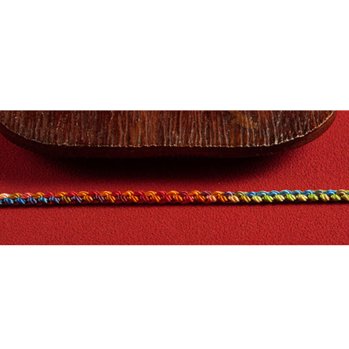 Buddha Stones „Niech będziesz błogosławiony pokojem i bezpieczeństwem przez wszystkie cztery pory roku” Bransoletka na szczęście wielokolorowa