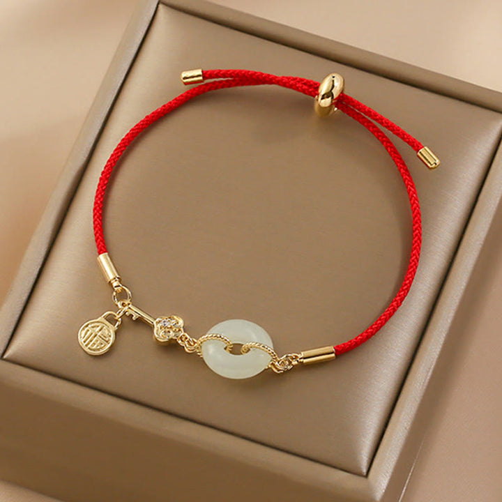 Buddha Stones 18K pozłacane Hetian Jade Peace Buckle Fu Character Luck Red Rope Bracelet