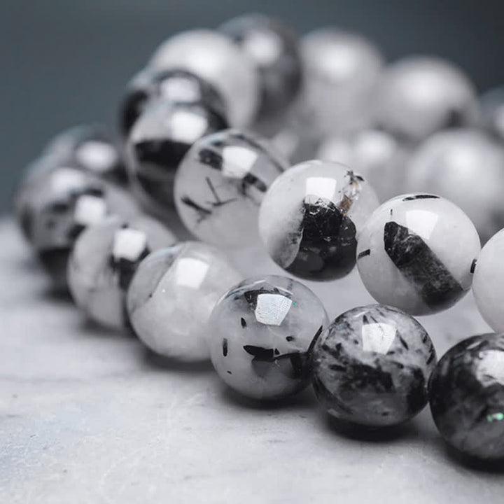 Bransoletka dla pary z czarnego kwarcu rutylowego, drewna hebanowego i białego kryształu