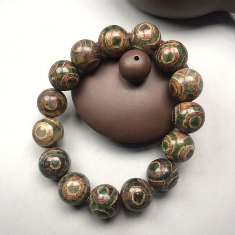 Bransoletka na szczęście z Buddha Stones z trzema oczami Dzi Bead Sardonyx