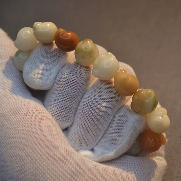 Wielowarstwowa bransoletka z Buddha Stones z nasionami Bodhi i słodkimi łapkami kota - image 11