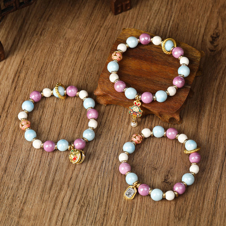 Buddha Stones Tybetańskie Zakiram Bogini Bogactwa Królik Głowa Lwa Charm Liuli Szkło Kadzidło Popiół Porcelanowa Koralik Ochrona Bransoletka