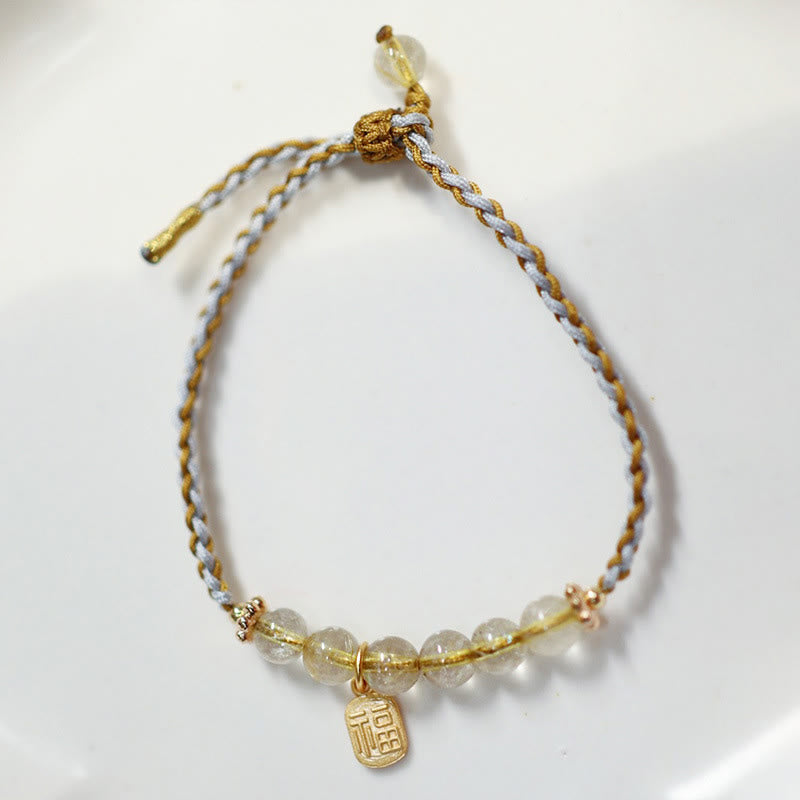 Bransoletka warkoczowa z naturalnego jadeitu i kwarcu rutylowego Fu Character Luck wykonana ze srebra próby 925