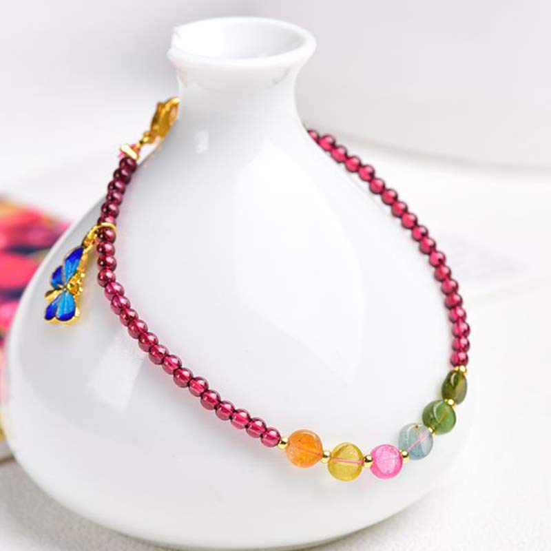 Bransoletka ochronna z turmalinem granatowym i motylem