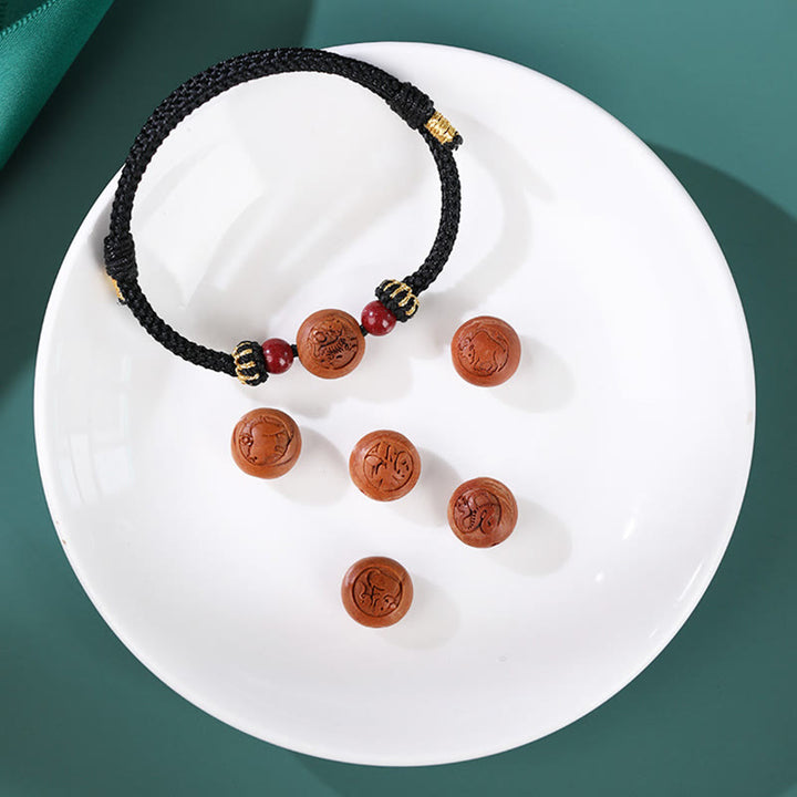 Buddha Stones Naturalne Drewno Brzoskwiniowe Chińskie Zodiak Fu Znak Rzeźbiony Cynober Bransoletka Bogactwa