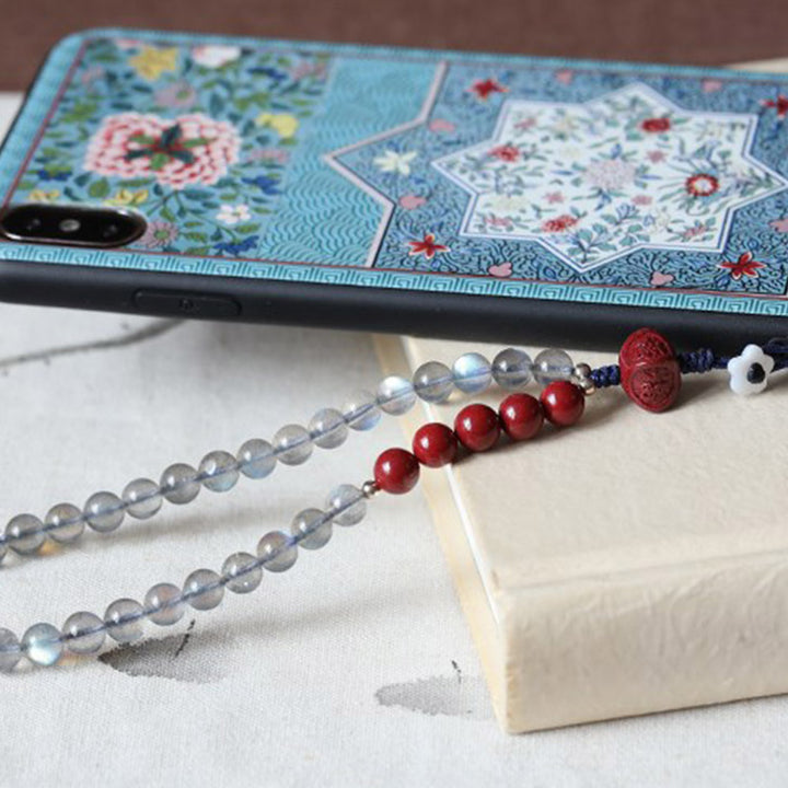 Naturalny kamień księżycowy cynober spokojna pozytywna dekoracja telefonu