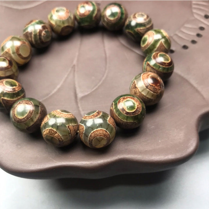 Bransoletka na szczęście z Buddha Stones z trzema oczami Dzi Bead Sardonyx