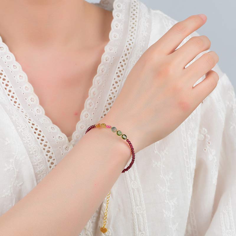 Bransoletka ochronna z turmalinem granatowym i motylem