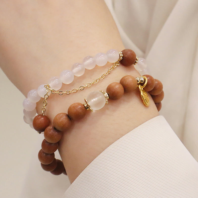 Bransoletka ochronna z Buddha Stones, sandałowym drzewem i kocim okiem Fu Character Charm