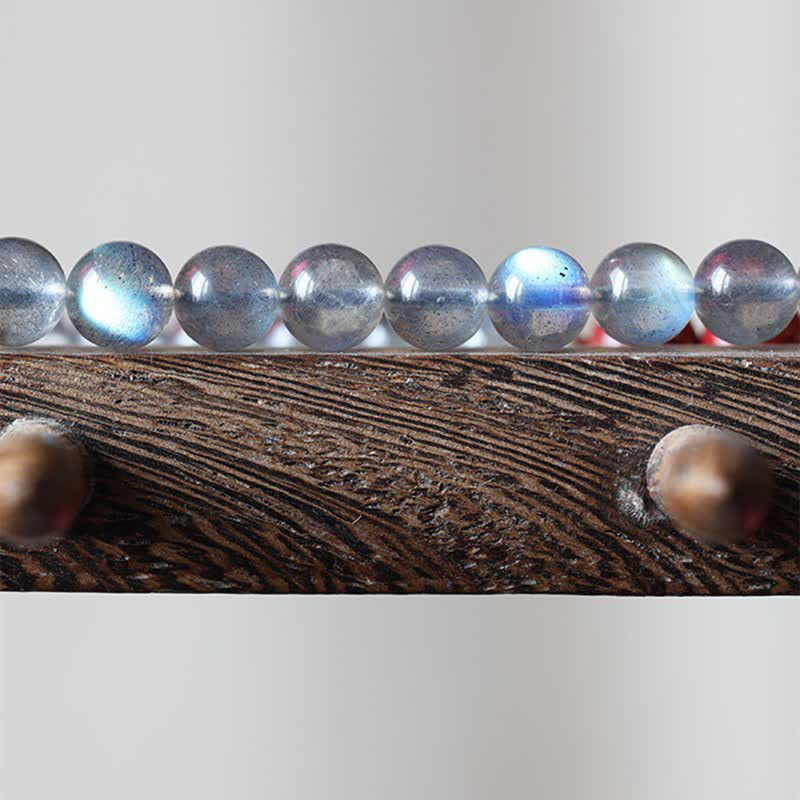 Naturalny kamień księżycowy cynober spokojna pozytywna dekoracja telefonu