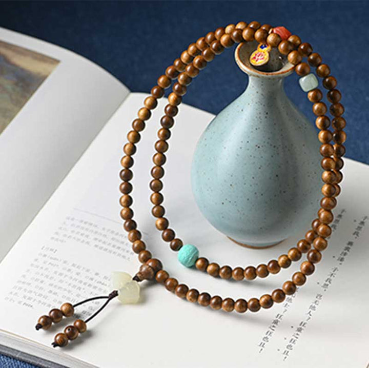 Bransoletka ochronna z palisandru tybetańskiego z Buddha Stones Mala