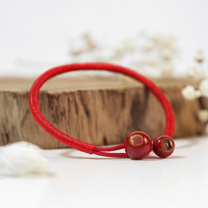 Bransoletka ceramiczna z Buddha Stones FengShui Lucky Red String