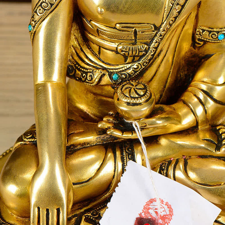Dekoracja miedzianej figurki Buddy Siakjamuniego Współczucia