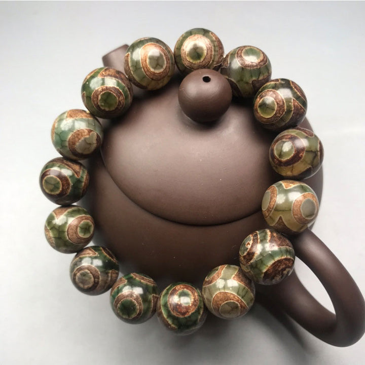 Bransoletka na szczęście z Buddha Stones z trzema oczami Dzi Bead Sardonyx