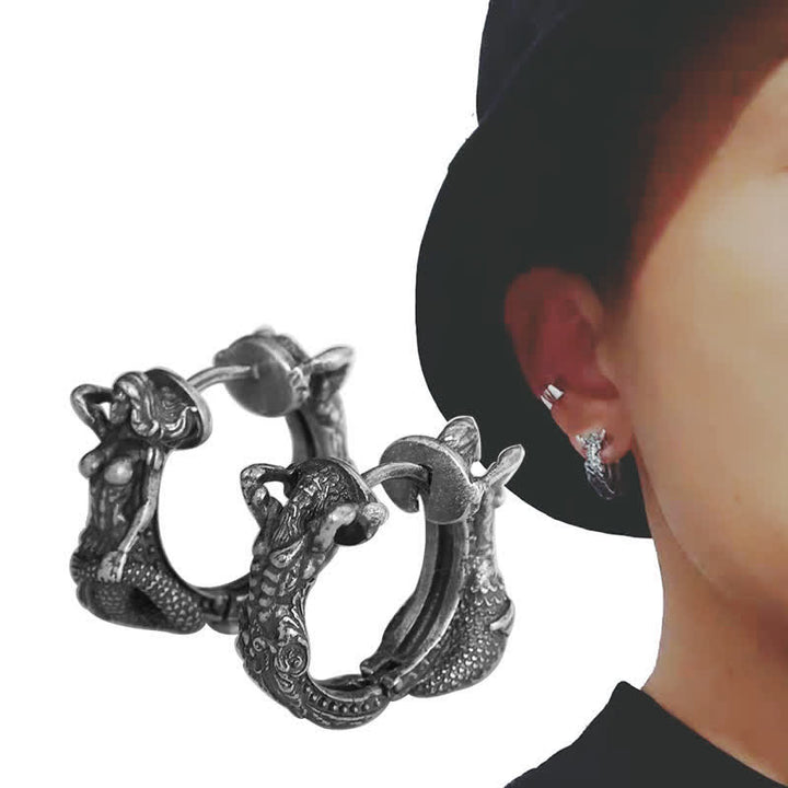 Kolczyki ochronne ze srebra próby 925 w kształcie kółek ze smokiem