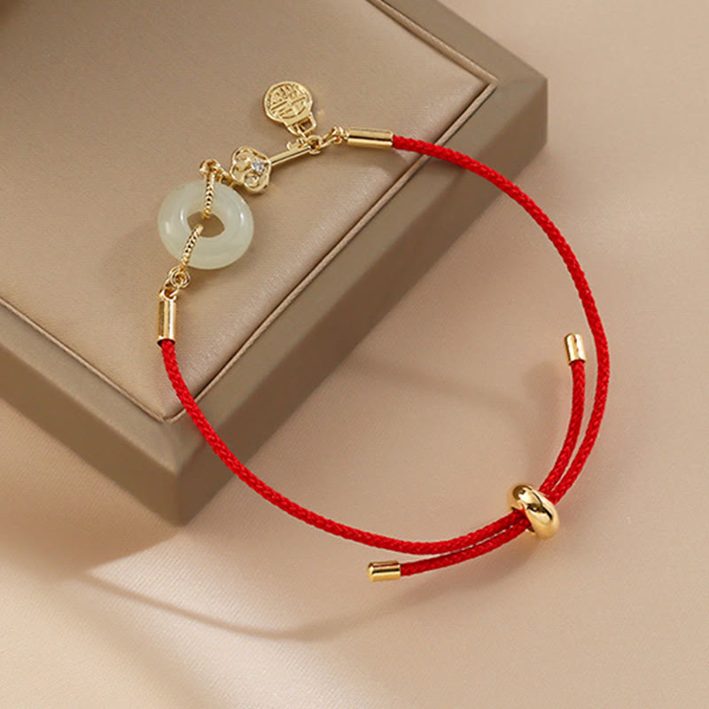 Buddha Stones 18K pozłacane Hetian Jade Peace Buckle Fu Character Luck Red Rope Bracelet