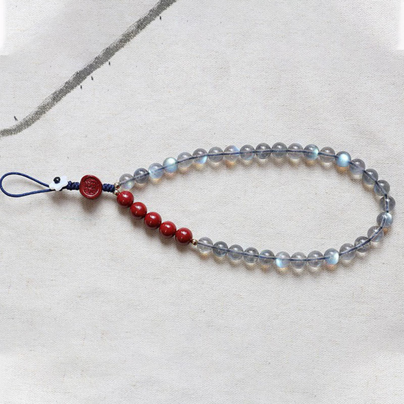 Naturalny kamień księżycowy cynober spokojna pozytywna dekoracja telefonu