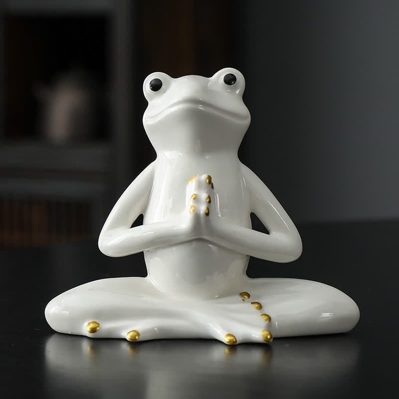 Medytująca ceramiczna figurka żaby zen