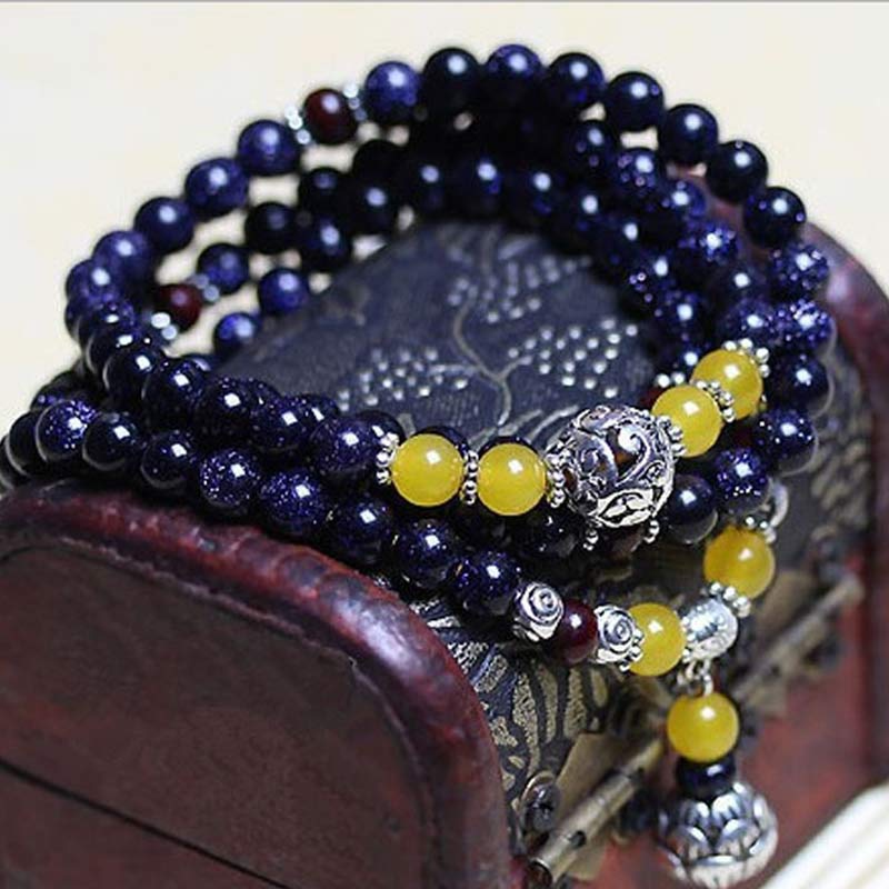 Bransoletka z zawieszkami bogactwa z niebieskiego piaskowca i Buddha Stones Mala