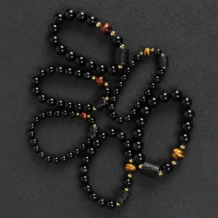 Bransoletka dla par z czarnego obsydianu i drewna hebanowego, czerwonego tygrysiego oka