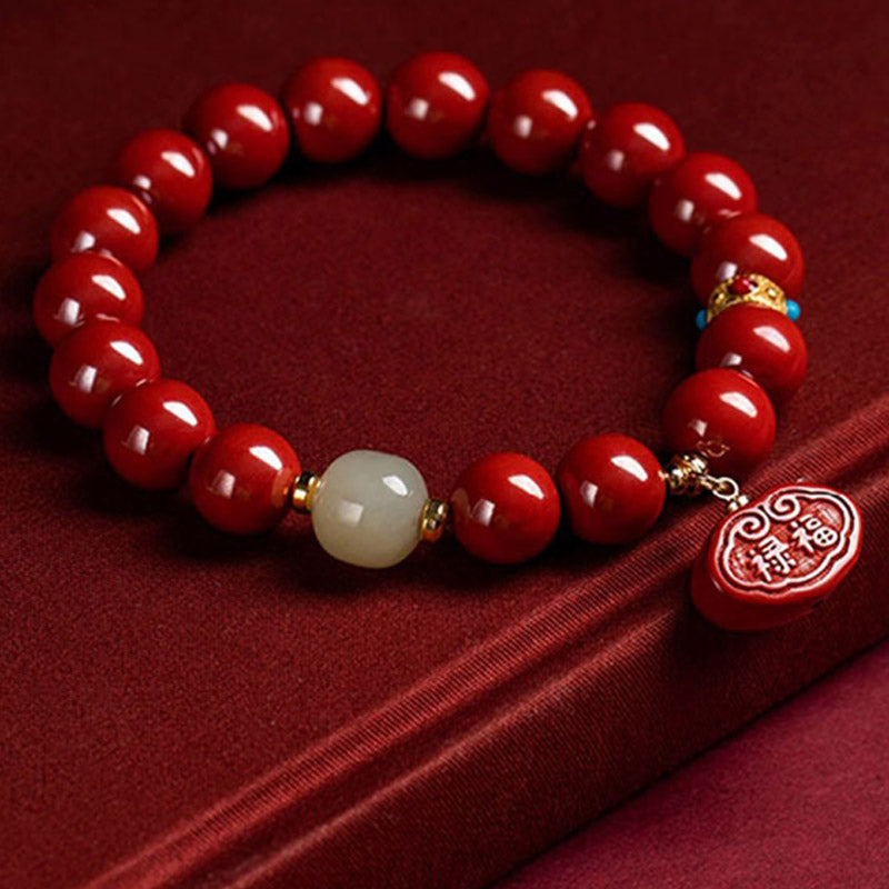 Bransoletka z zawieszkami ochronnymi z jadeitu i Buddha Stones