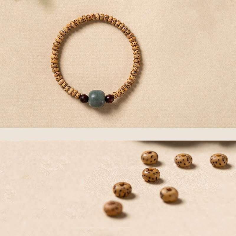 Bransoletka mądrości z małych liści drzewa sandałowego z nasion Bodhi w kolorze czerwonym z Buddha Stones