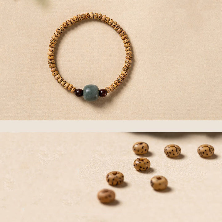 Bransoletka mądrości z małych liści drzewa sandałowego z nasion Bodhi w kolorze czerwonym z Buddha Stones