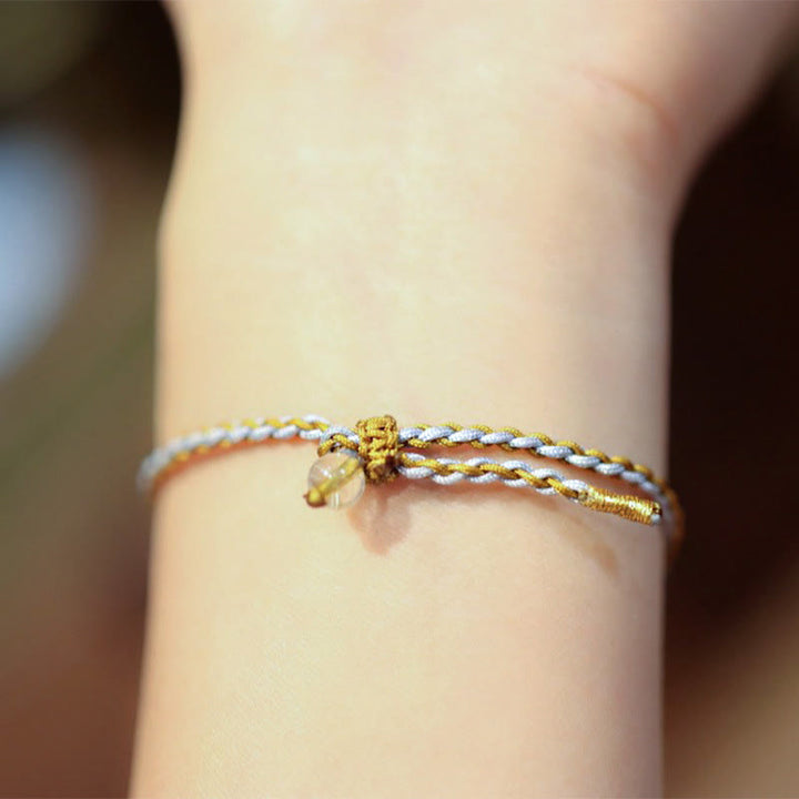 Bransoletka warkoczowa z naturalnego jadeitu i kwarcu rutylowego Fu Character Luck wykonana ze srebra próby 925