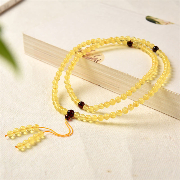 Buddha Stones 108 Mala Beads Naturalny Bursztyn Przezroczysta Bransoletka Antystresowa