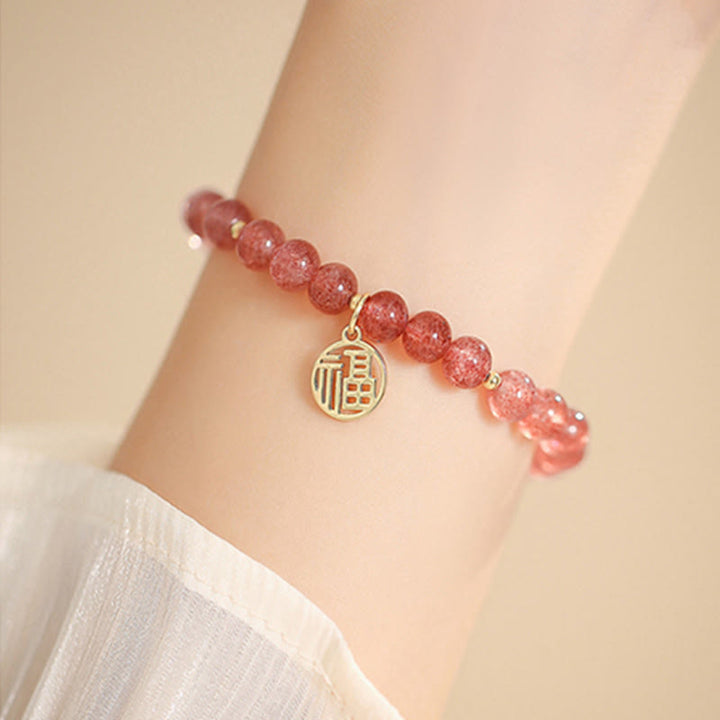 Bransoletka z Buddha Stones 14K pozłacana kwarcem truskawkowym Fu Character Healing Charm