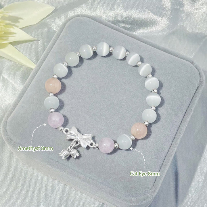 Bransoletka z zawieszką w kształcie rozety z Buddha Stones , kociego oka i lawendowego ametystu