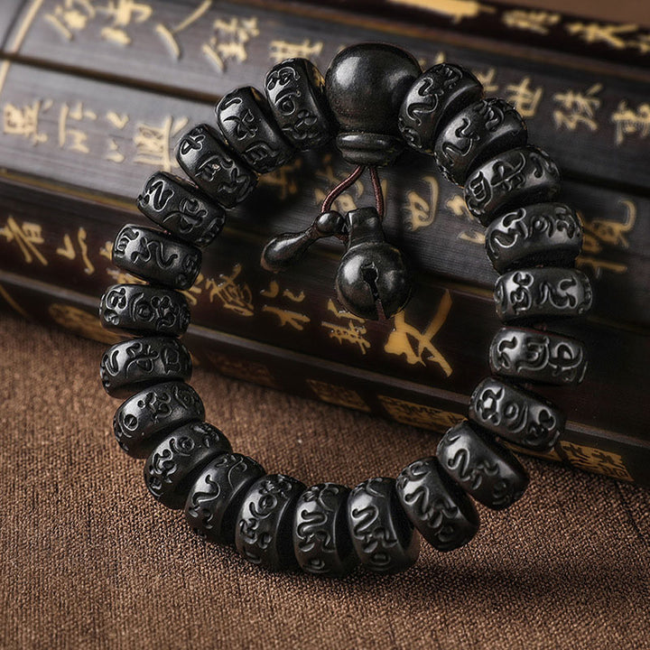 Bransoletka ochronna z drewna tybetańskiego z Buddha Stones i uderzeniem pioruna - image 0