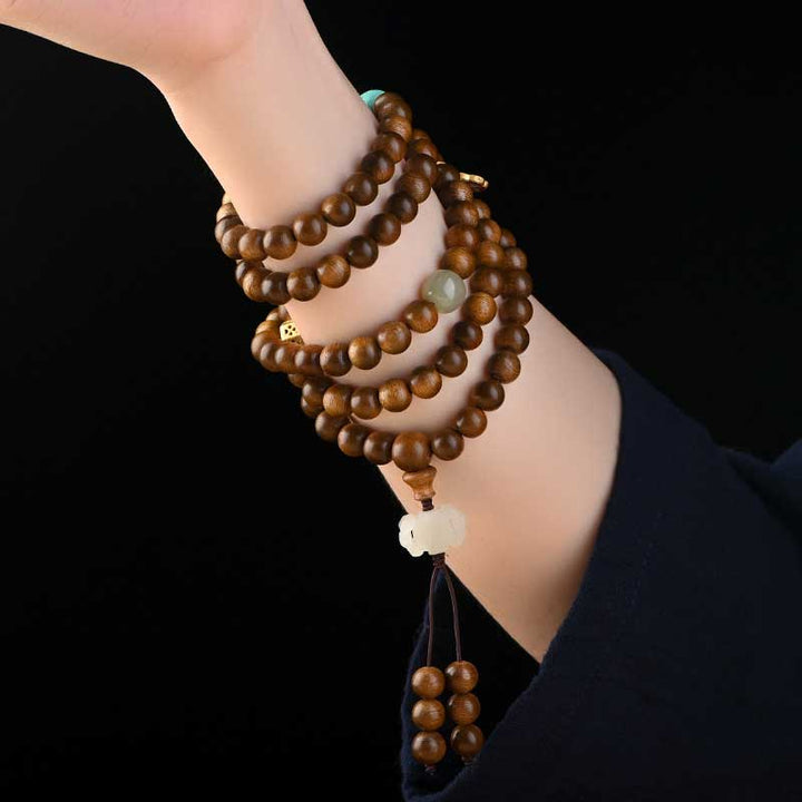Bransoletka ochronna z palisandru tybetańskiego z Buddha Stones Mala