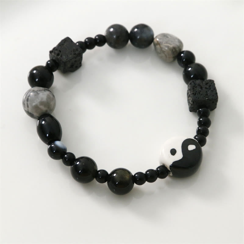 Bransoletka ochronna z Buddha Stones z czarnego onyksu i koralikami z jaspisu Picasso Yin Yang