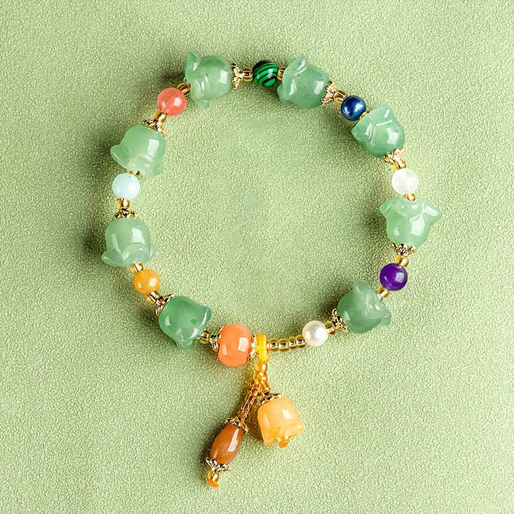 Bransoletka szczęścia z zielonych Buddha Stones awenturynu i kwiatów magnolii