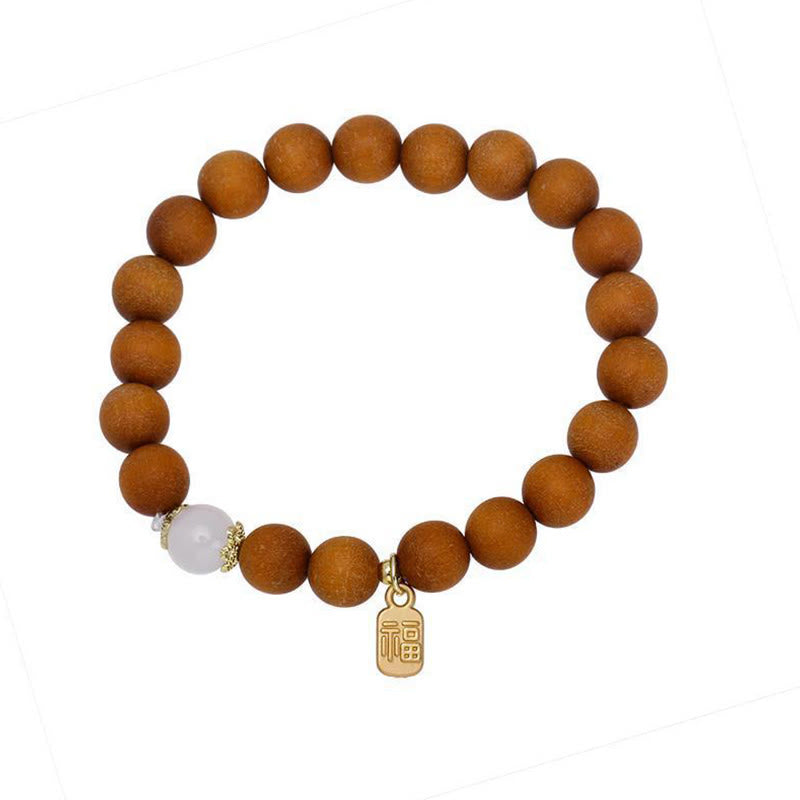 Bransoletka ochronna z Buddha Stones, sandałowym drzewem i kocim okiem Fu Character Charm