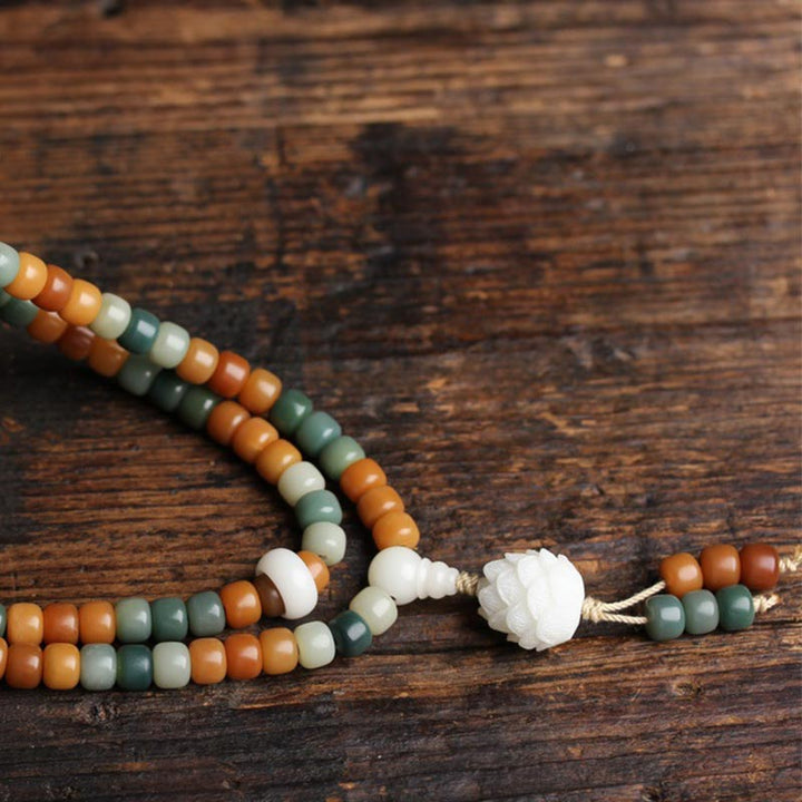 Buddha Stones Bransoletka z harmonijnego naszyjnika Bodhi Lotus Mala
