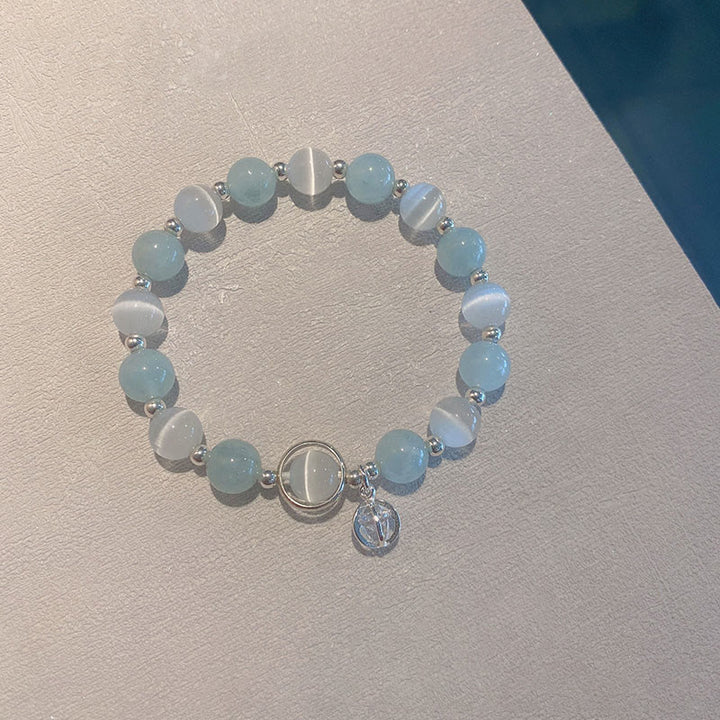 Bransoletka z zawieszkami Buddha Stones 925 ze srebra próby 925 z motywem kociego oka i akwamarynu