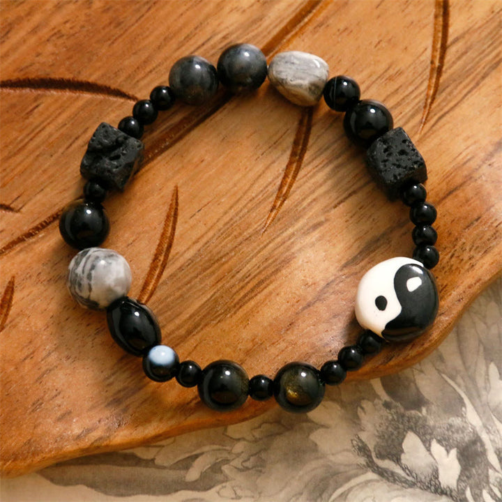 Bransoletka ochronna z Buddha Stones z czarnego onyksu i koralikami z jaspisu Picasso Yin Yang