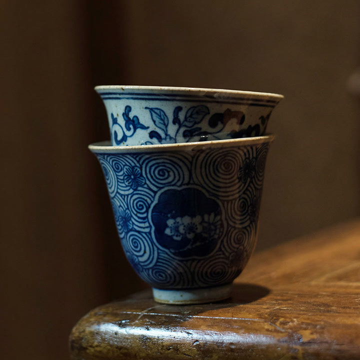 Buddha Stones Jingdezhen Niebiesko-biała porcelana Malowana ręcznie Lotos Kwiat Śliwki Ceramiczna filiżanka do herbaty Kung Fu Filiżanki do herbaty