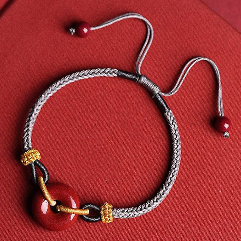 Bransoletka pleciona z ręcznie robionej klamry Cinnabar Peace Buddha Stones